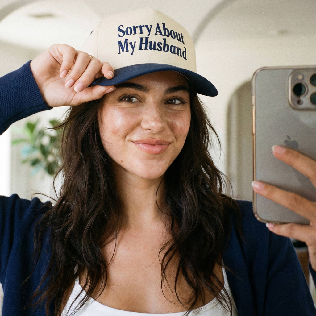 SORRY ABOUT MY HUSBAND Trucker Hat