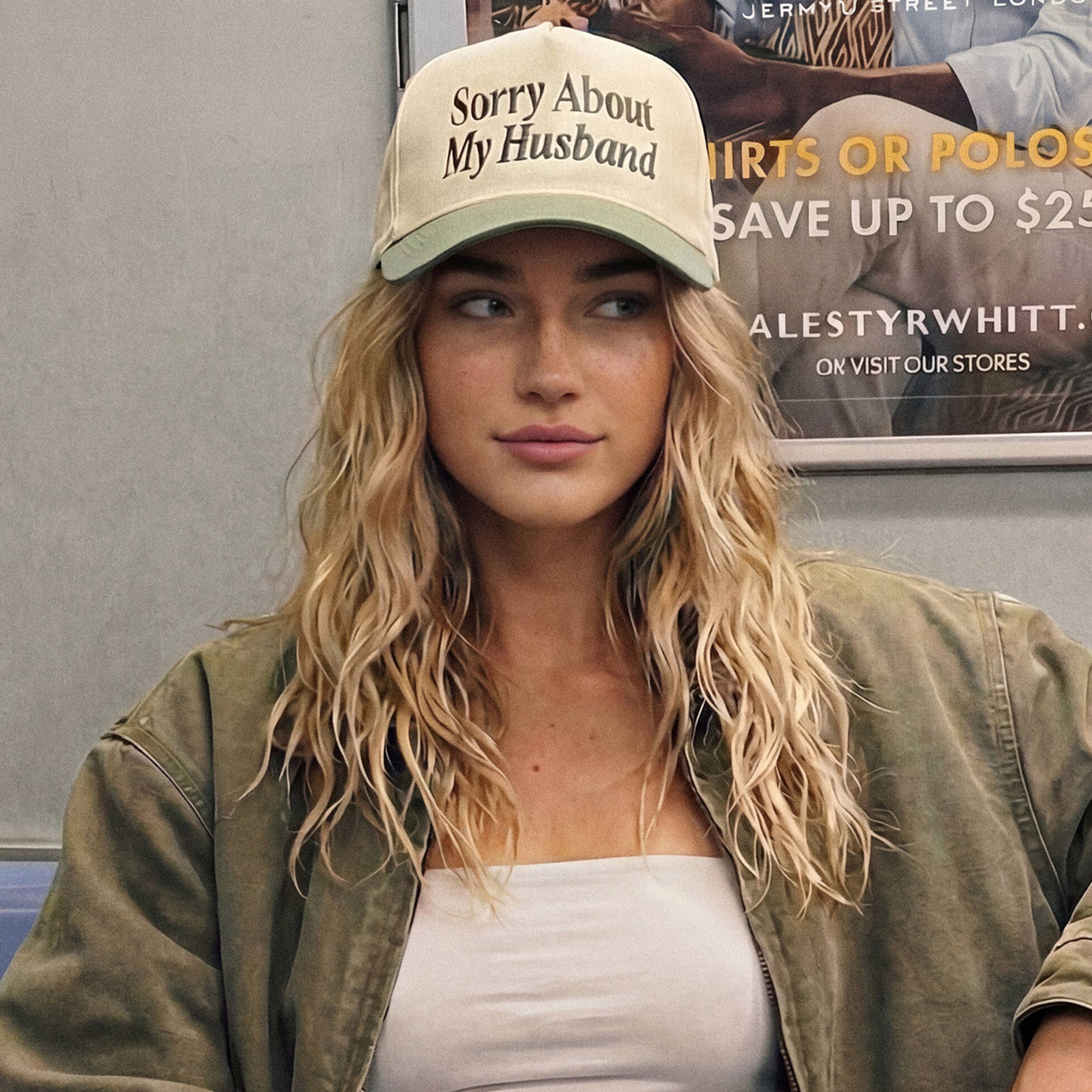 SORRY ABOUT MY HUSBAND Trucker Hat